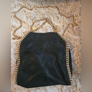 STELLA MCCARTNEY
The Falabella mini faux brushed-leather shoulder bag